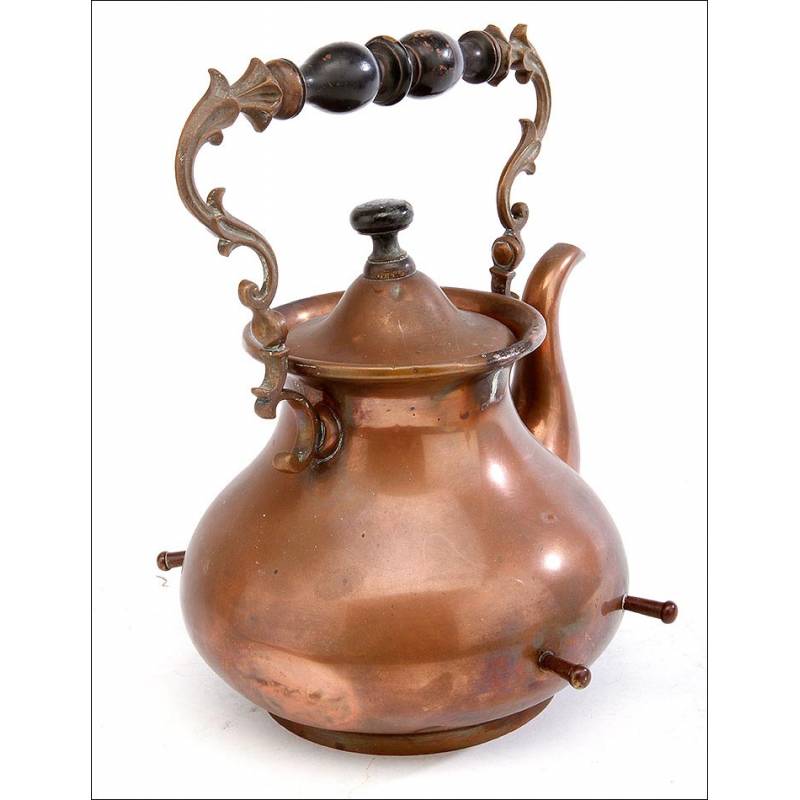 https://www.antiguedades.es/101814-large_default/beautiful-copper-teapot-with-art-nouveau-decoration-complete-circa-1920-1940.jpg