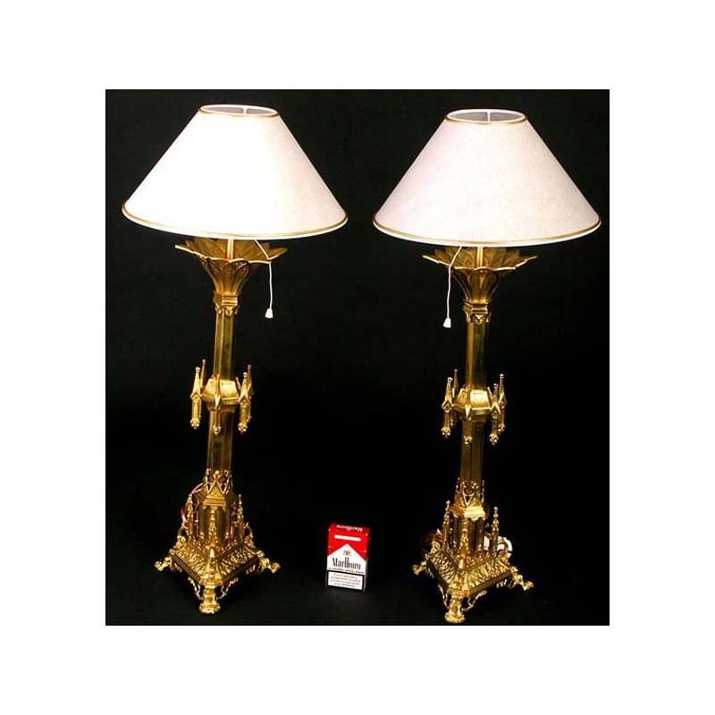 A pair of English solid brass Gothic style 19 century candlesticks
