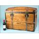 Antique trunk with metal reinforcements.