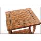 Spectacular game table with folding marquetry. XX CENTURY