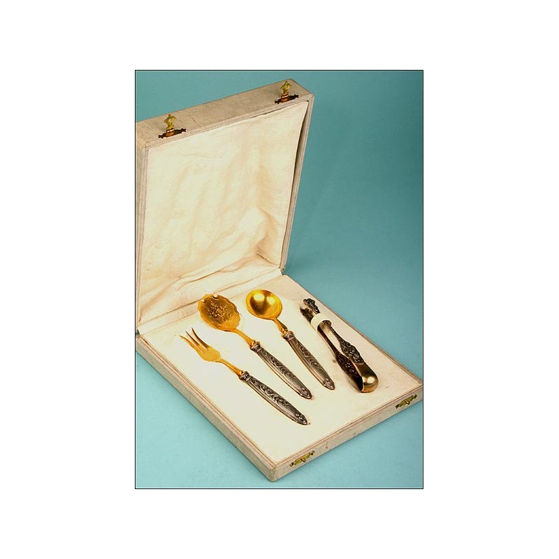 Silver and gold plated hors d'oeuvre serving set.