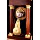 Antique Portico Mantel Clock with gilt pendulum. France 1900