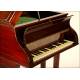 Extraordinarily rare Columbia Gramophone with Piano Form. Mahogany wood.