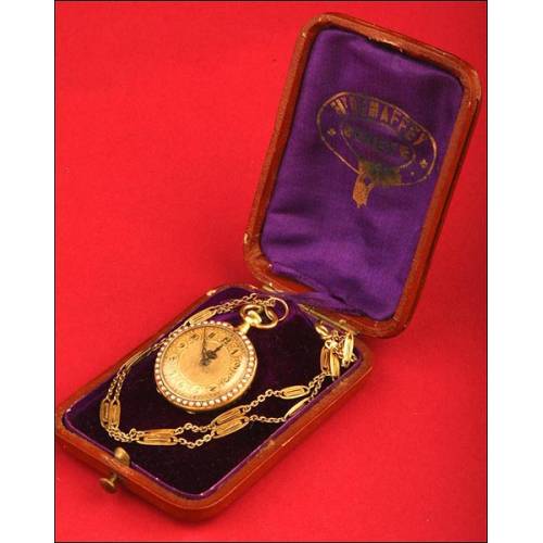 French 18kt gold pendant watch.