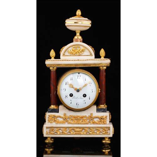 Beautiful antique mantel clock in marble and bronze. France, Circa 1870