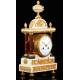 Beautiful antique mantel clock in marble and bronze. France, Circa 1870