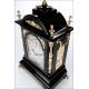 Spectacular Ebony and Bronze Bracket Clock with Triple Sounder. England, XIX Century