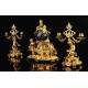 Gilded Bronze Clock and Candelabra Set. France, XIX Century