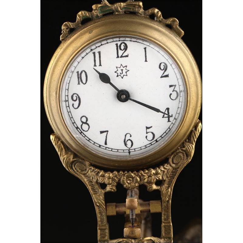 Junghans Mystery Clock made in Bronze and Wood in 1905. Working