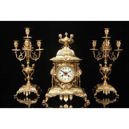 Spectacular Clock and Candelabra Set in gilded bronze. France, XIX Century