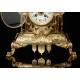 Spectacular Clock and Candelabra Set in gilded bronze. France, XIX Century