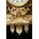 Espectacular Conjunto de Reloj con Candelabros en Bronce dorado. Francia, Siglo XIX