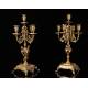 Espectacular Conjunto de Reloj con Candelabros en Bronce dorado. Francia, Siglo XIX