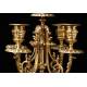 Espectacular Conjunto de Reloj con Candelabros en Bronce dorado. Francia, Siglo XIX