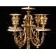 Espectacular Conjunto de Reloj con Candelabros en Bronce dorado. Francia, Siglo XIX