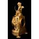 Delicate Mantel Clock in Gilded Bronze with Cupid. France, XIX Century