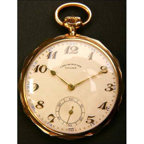 Pocket watch in solid 14K gold.