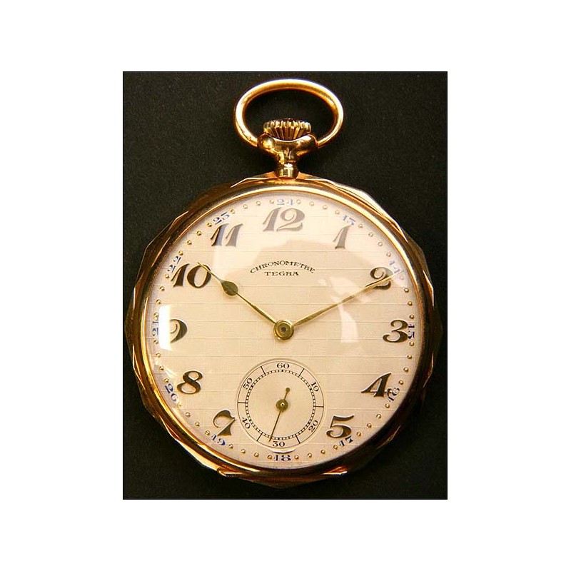 Pocket watch in solid 14K gold.