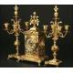 Bronze mantel clock with candelabra. 1885