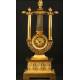 Antique gilt bronze and Lyre shape clock. S. XIX