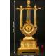 Antique gilt bronze and Lyre shape clock. S. XIX