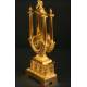 Antique gilt bronze and Lyre shape clock. S. XIX