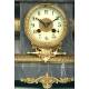 Marble and bronze mantel clock. Taps. 1900