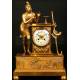 Antique French gilt bronze clock. 1850. Allegory of music