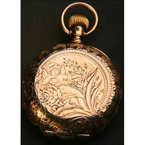 Pocket watch in 14K solid gold.