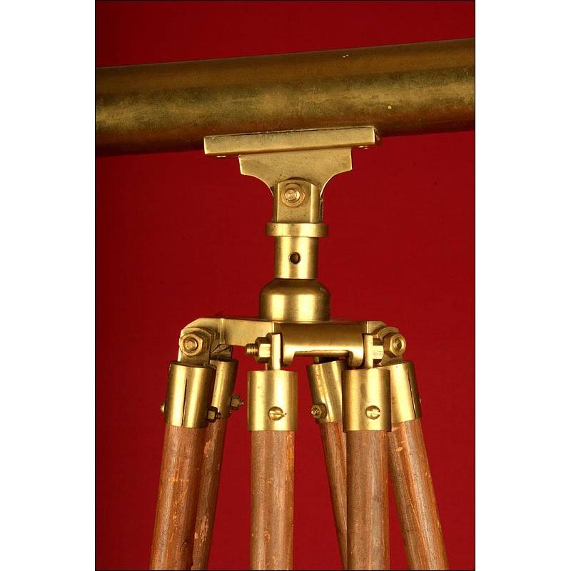 At Auction: early 1900's brass telescope w/ working wooden legs