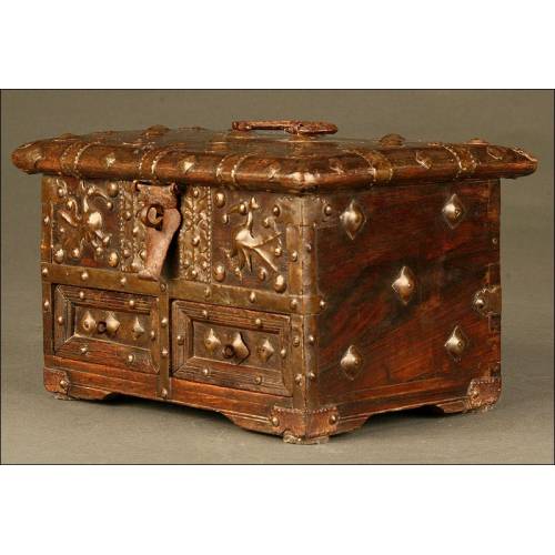 Solid Wood Studded Cash Chest. XIX Century.